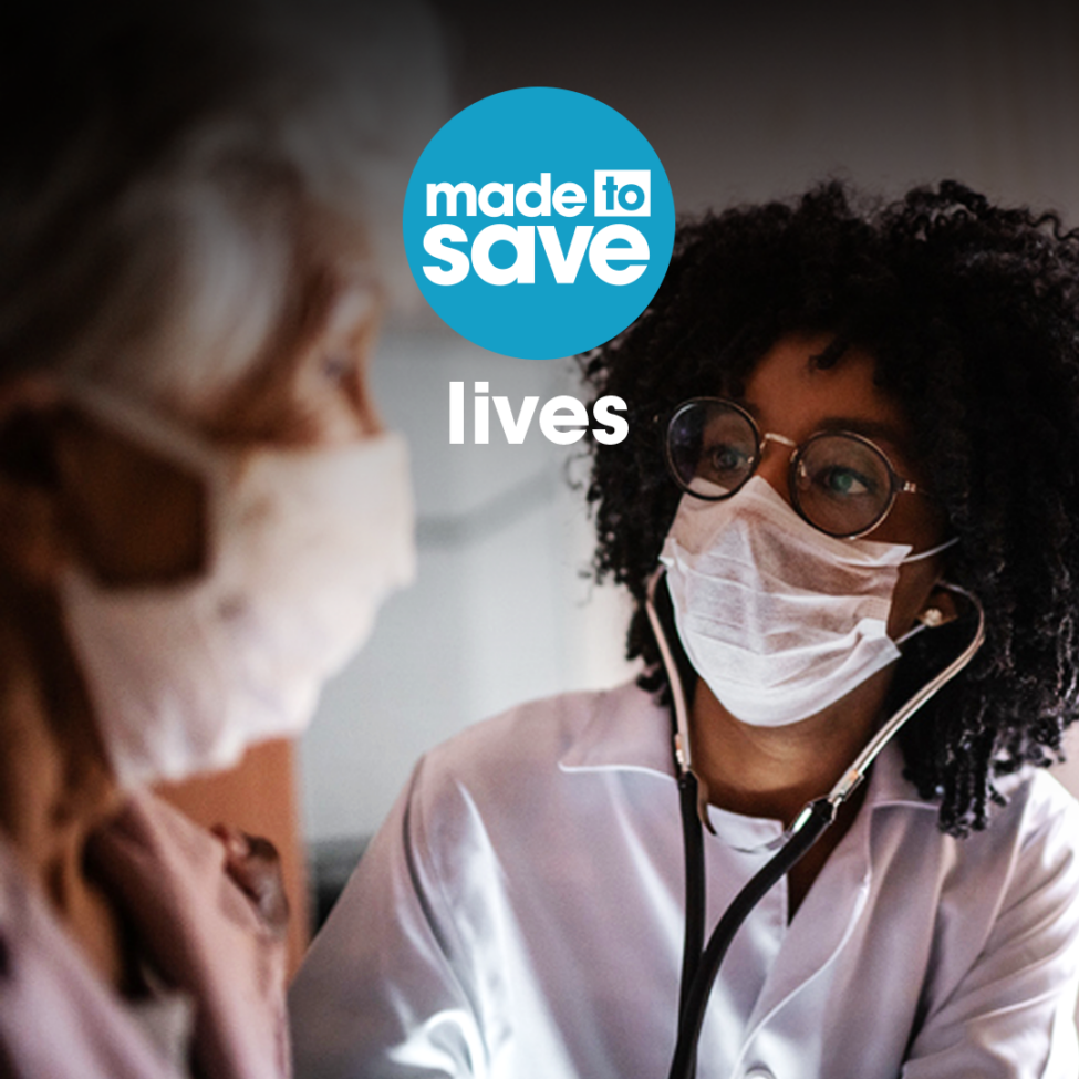 A Black female doctor in a mask giving an elderly woman a vaccine shot behind the text "made to save lives"